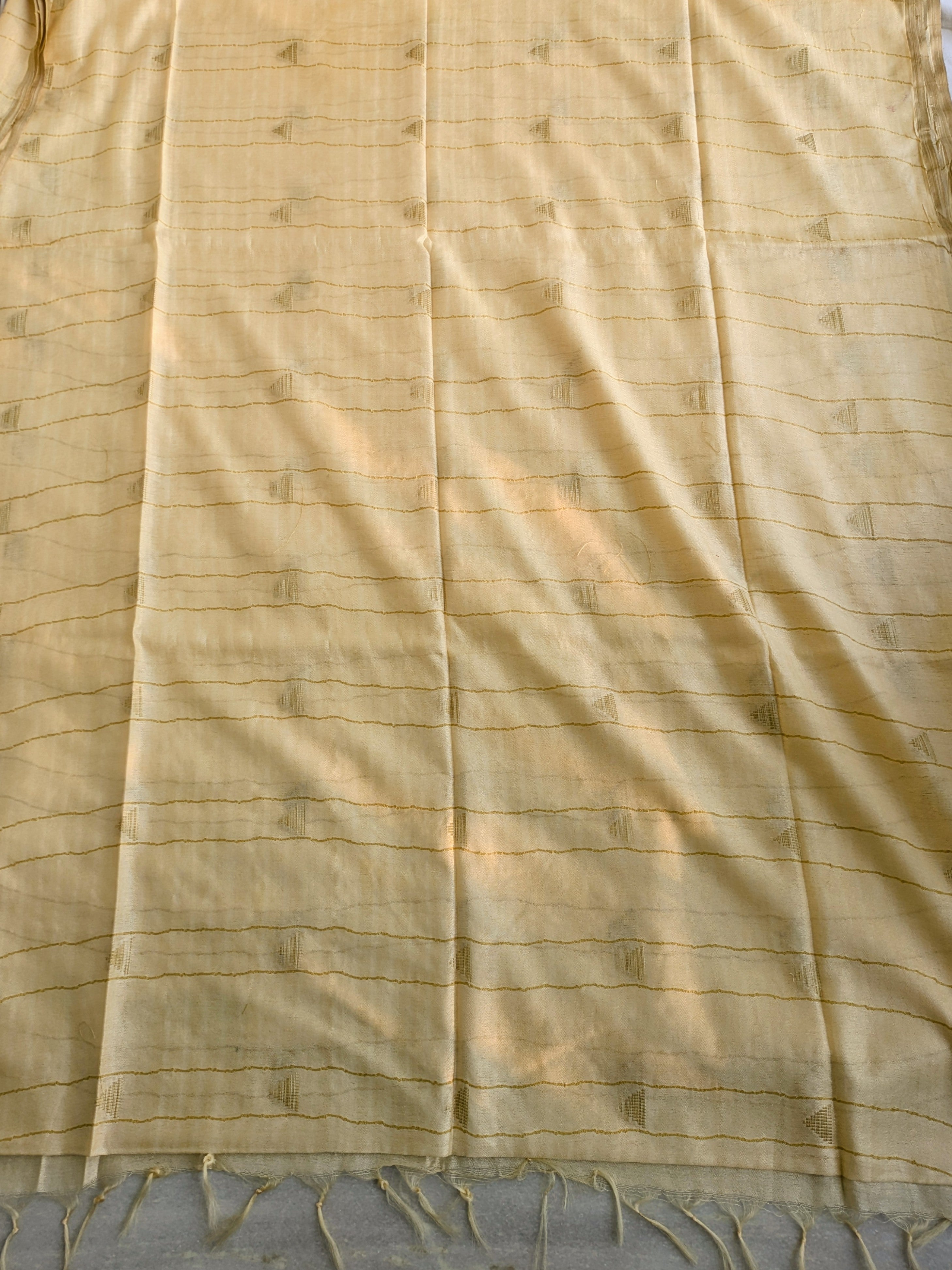 Close-up of beige fabric with visible texture