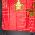 Red fabric with gold star and 'NEW' label on a black background