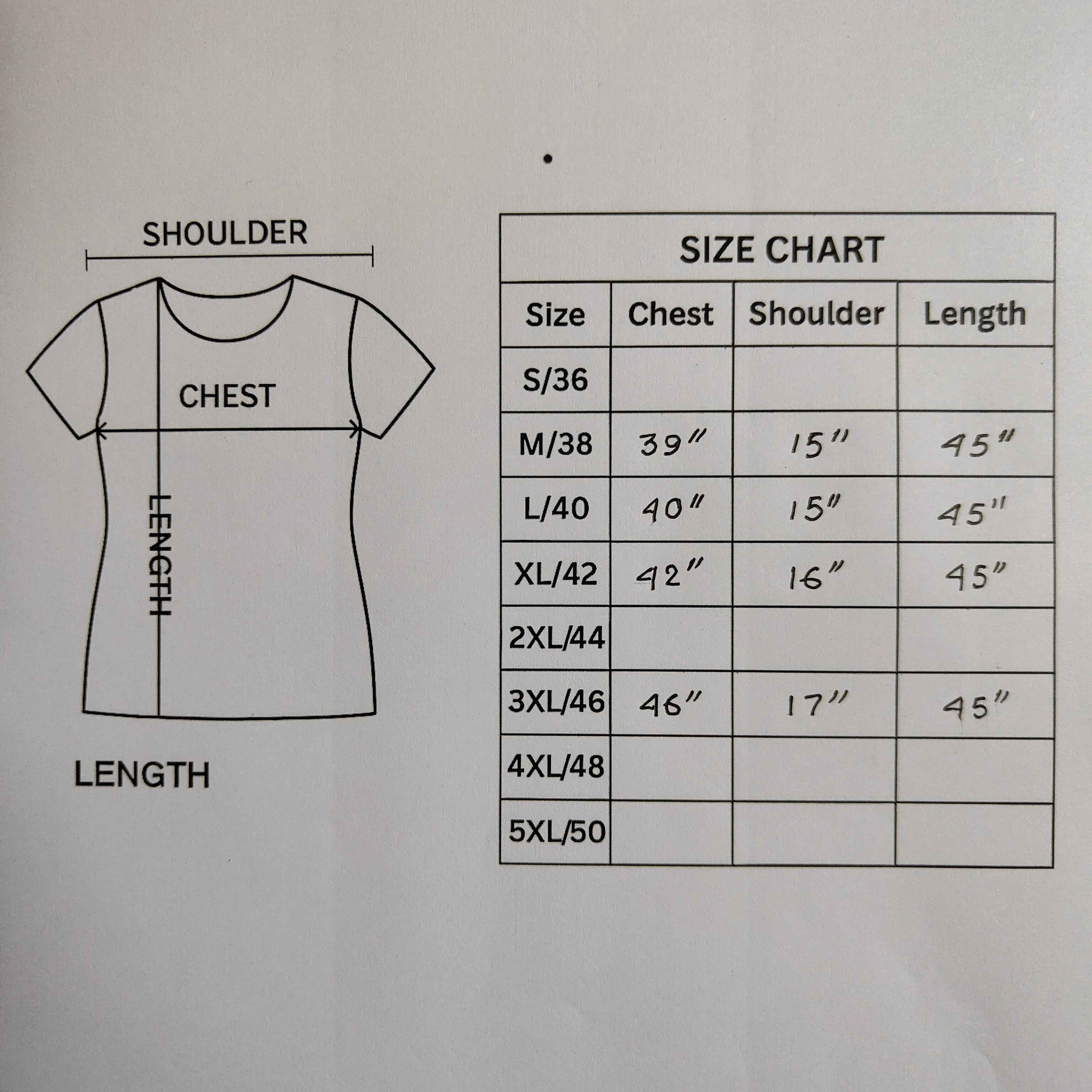Size chart for a t-shirt with measurements on a gray background
