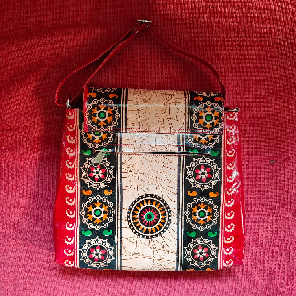 Decorative bag with intricate patterns on a red background