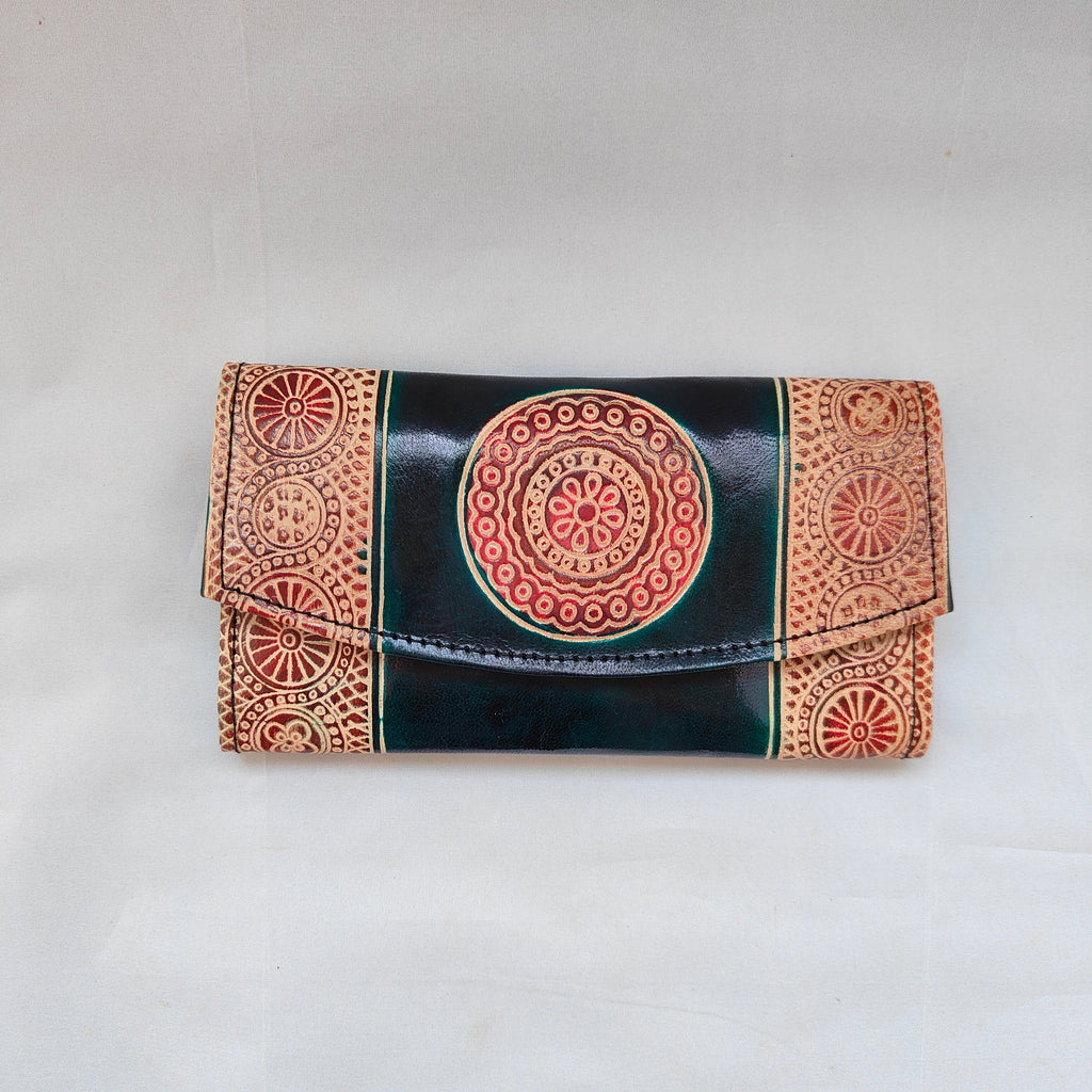 Decorative wallet with mandala design on a light gray background