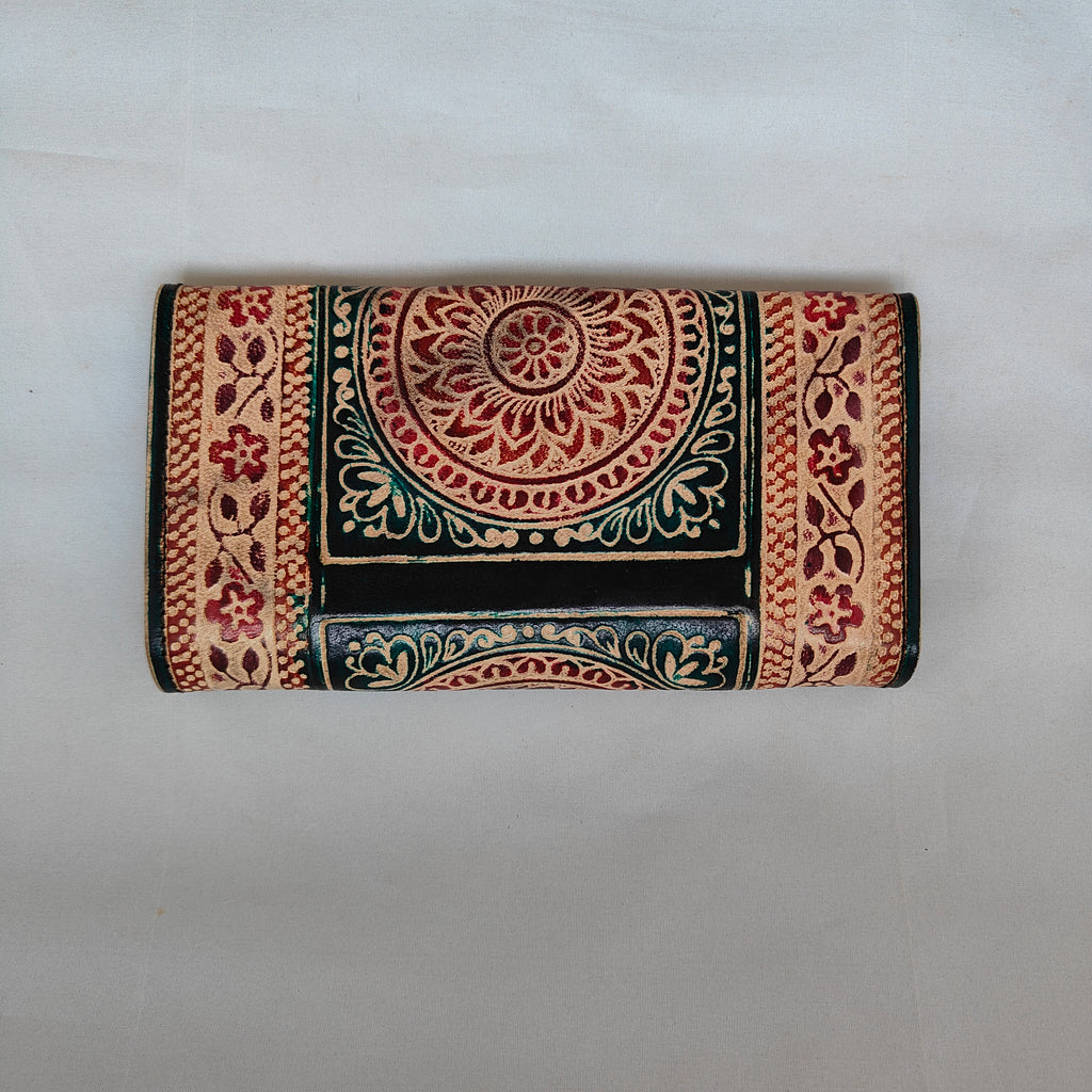 Decorative wallet with intricate patterns on a light gray background